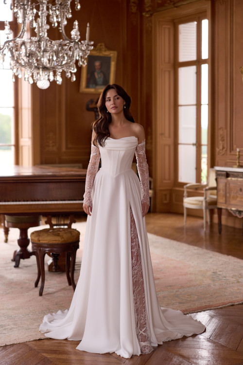 Elegant crepe A-line wedding dress model 5927 by Elizabeth Passion featuring a corset bodice and a long train.
