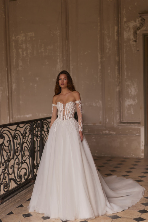 Wedding dress with corset, long sleeves, and train