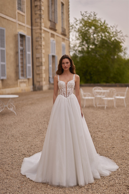 Wedding dress with corset, thin straps, and train