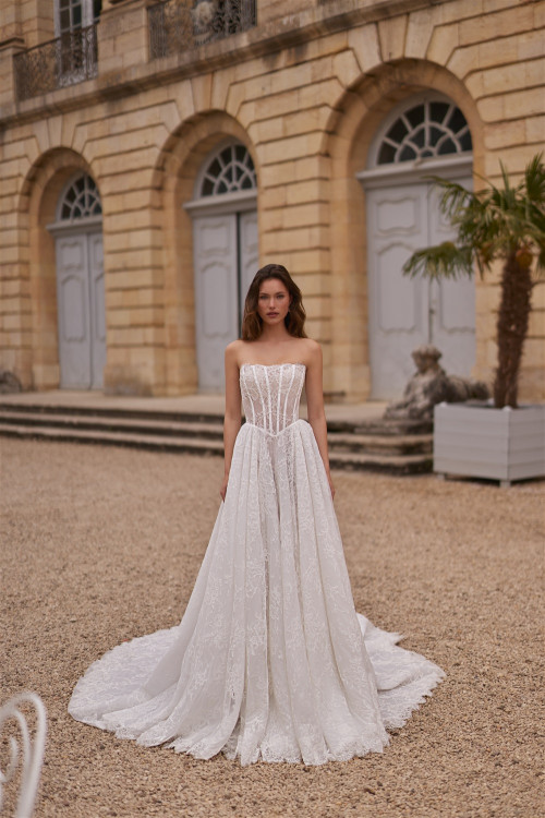 Lace wedding dress with corset, straight neckline, and train