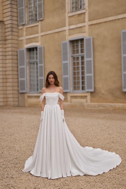Smooth wedding dress with drooping straps, train, and gloves