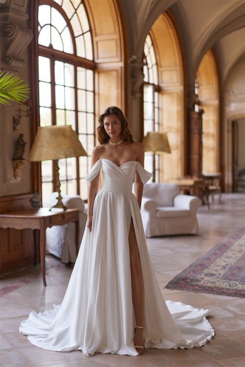 Smooth wedding dress with slit, drooping straps, and long train