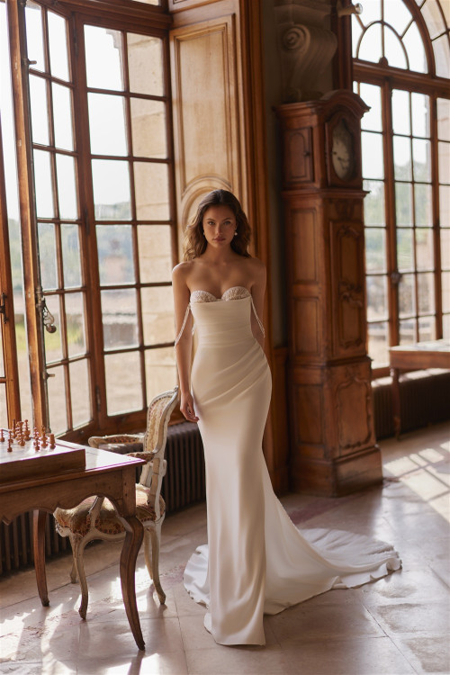 Smooth fitted mermaid wedding dress with corset and train